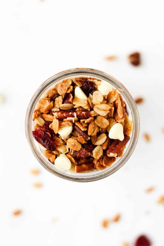 This healthy White Chocolate Orange Granola recipe is slightly fruity, sweet and perfect for breakfast or snack time. Vegan and gluten-free, too!