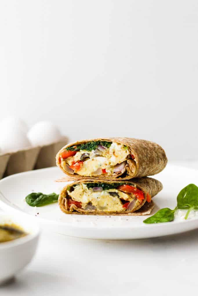 These Pesto Vegetable Egg Wraps make a delicious healthy breakfast or lunch recipe! With quality protein, healthy fat, and fibre, these vegetarian wraps should keep you feeling full and satisfied for hours.