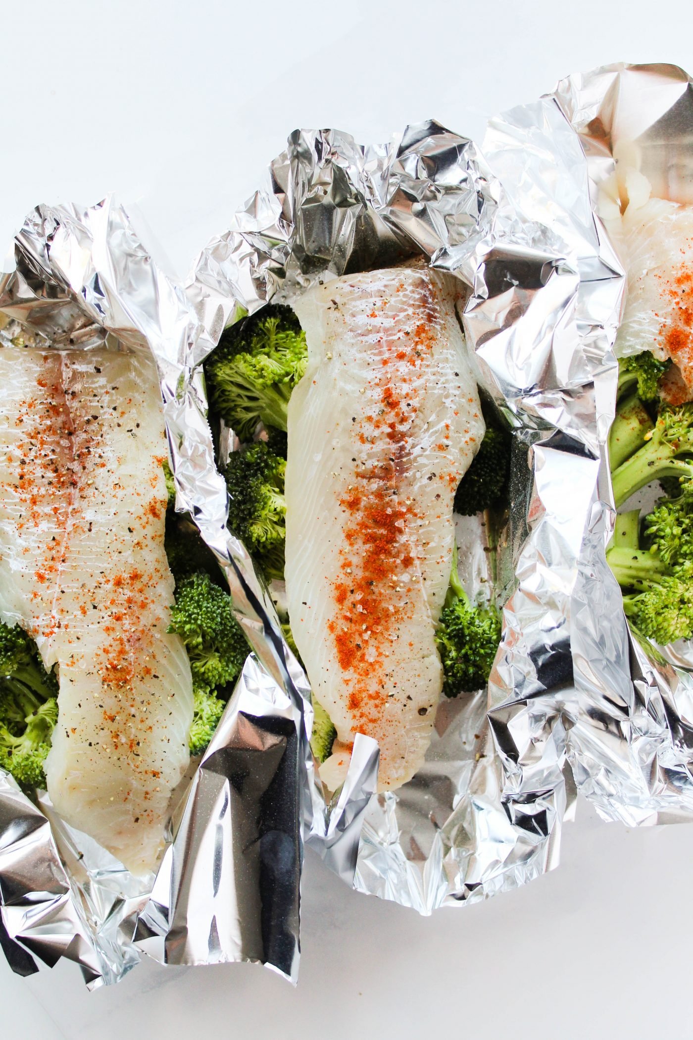 Broccoli and haddock in tin foil packets