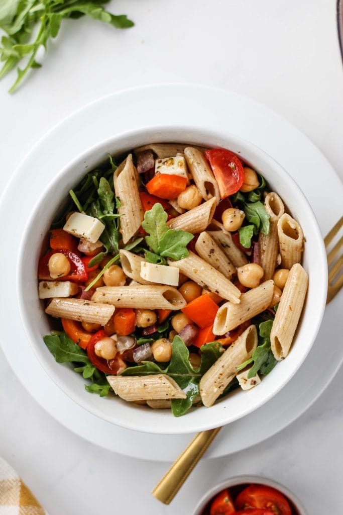 This zesty, easy Italian Pasta Salad is the perfect recipe to meal prep for the week. It's full of fibre, protein, and veggies! Pack it for lunch or serve it as a side dish with dinner! This recipe is vegetarian, and can easily be made vegan and gluten-free.