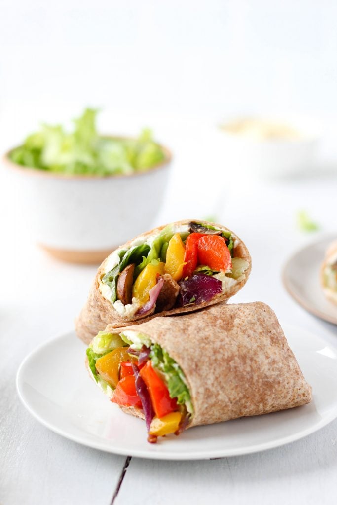 A simple and healthy yet super flavourful Grilled Veggie Wrap filled with balsamic marinated and grilled vegetables, goat cheese and hummus. Makes a delicious healthy lunch or dinner recipe!