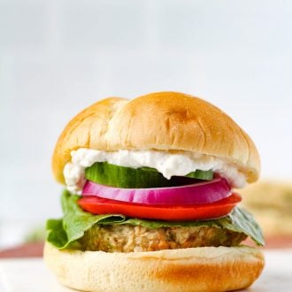 Juicy and flavourful Greek-inspired Chicken burgers that are simple to make. Topped with a quick, delicious, and super creamy Feta Aioli sauce.