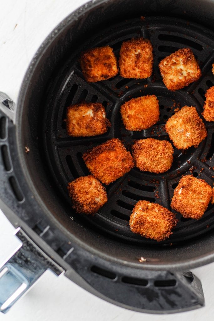 Cooked crispy tofu in an air fryer