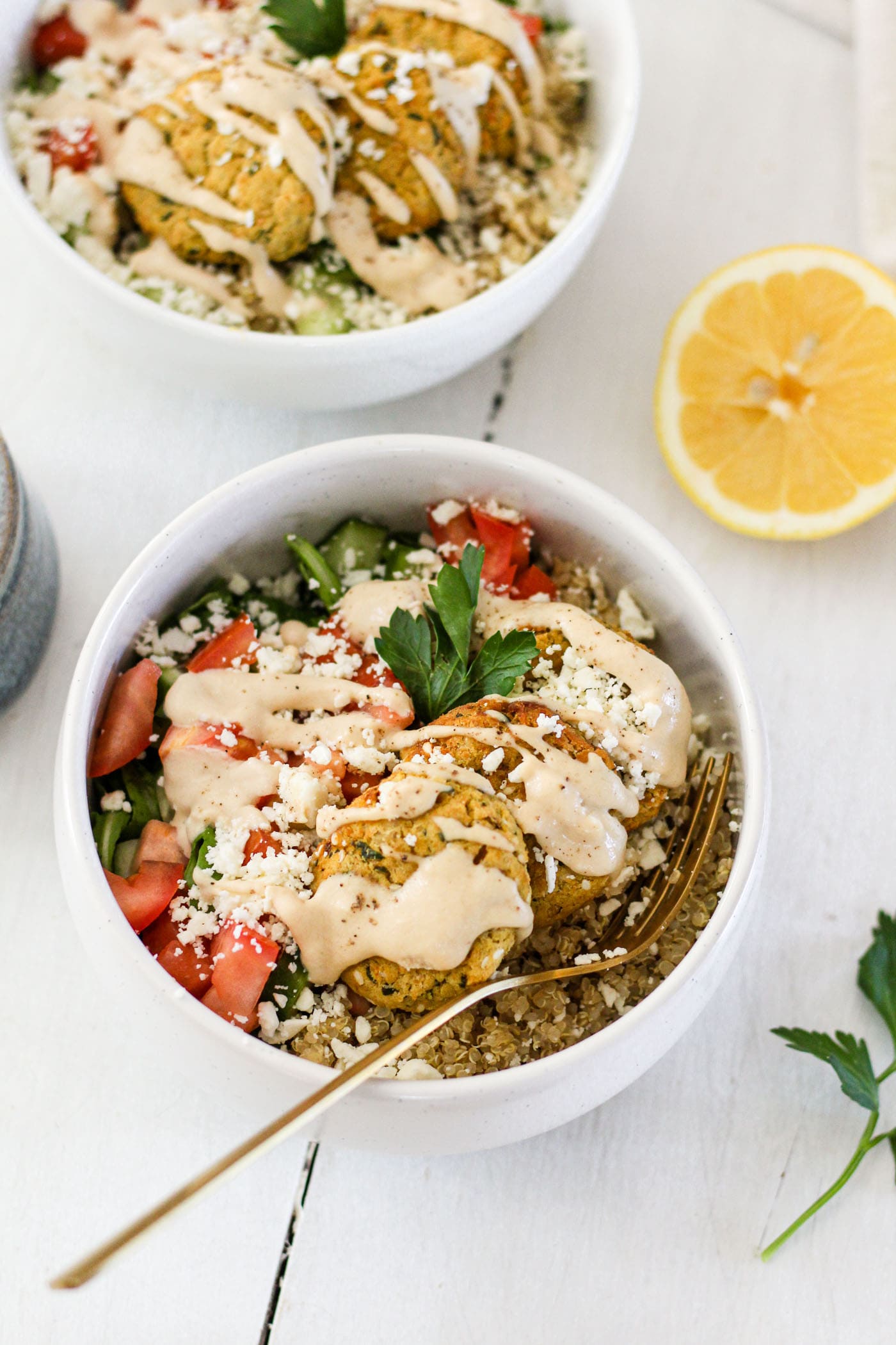 falafel bowls with vegetables, quinoa and lemon tahini sauce