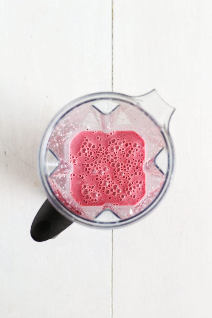 raspberry banana smoothie in a blender