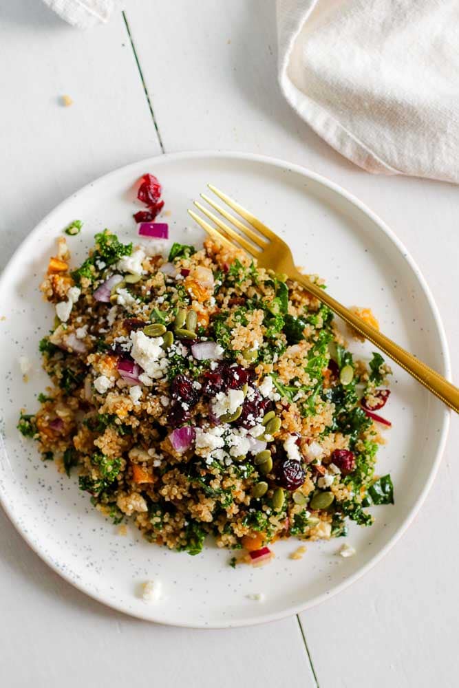 quinoa salad with kale and butternut squash on a plate