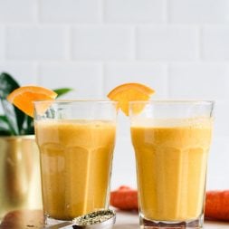 carrot orange smoothies in glasses
