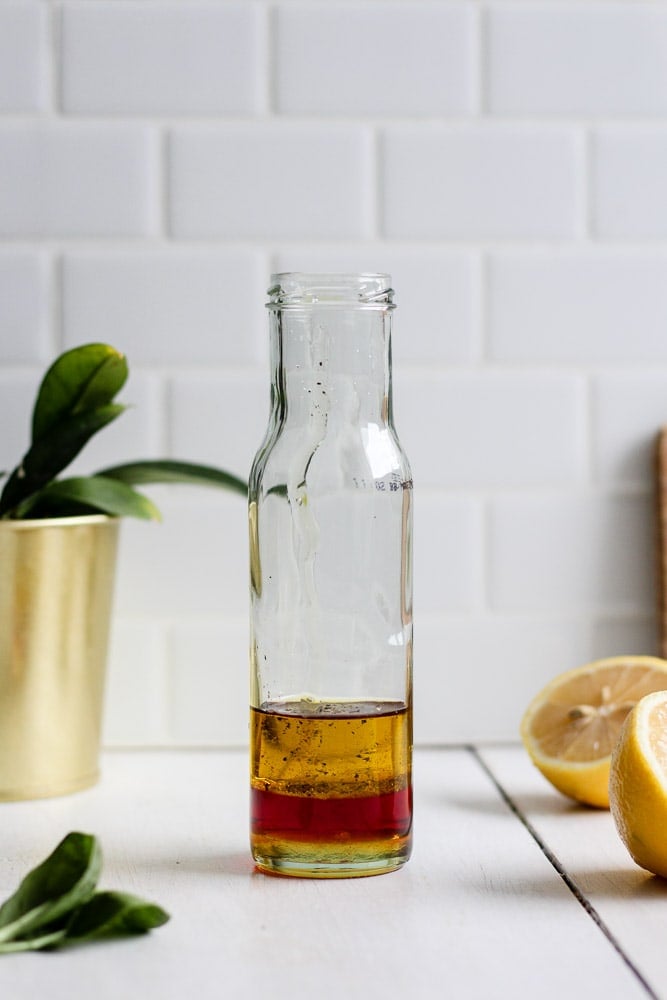 lemon vinaigrette ingredients in a jar