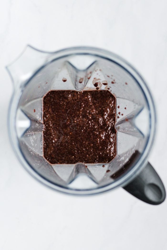 chocolate chia pudding in a blender before blending