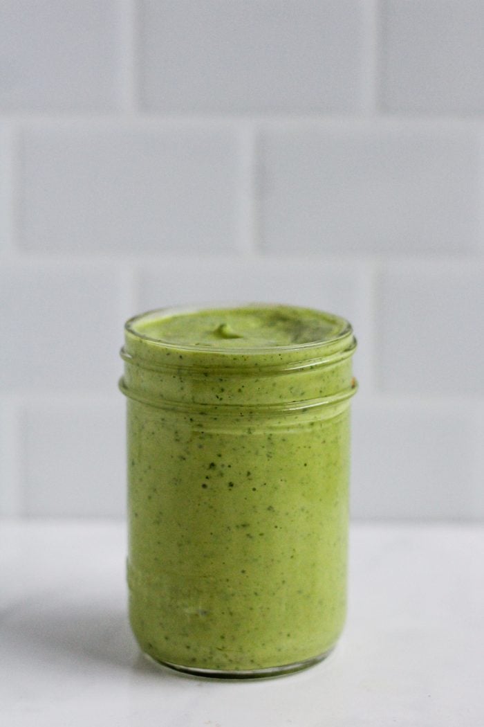 jar of green greek yogurt avocado salad dressing