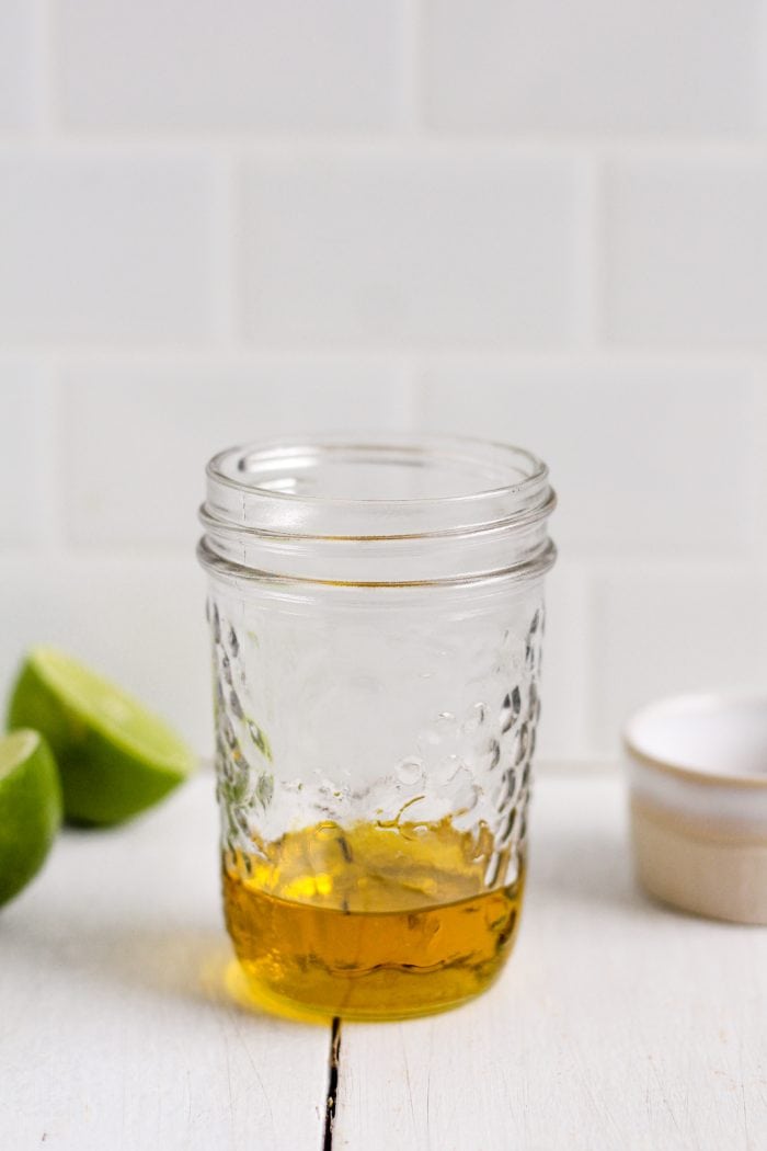 Mason jar with olive oil in it